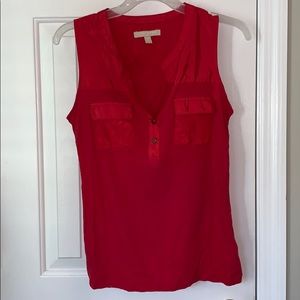 Sleeveless coral top with gold buttons